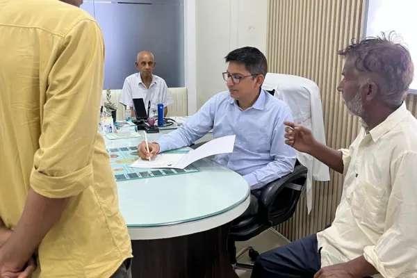 Dr. Shri Ram Gupta consulting with a patient at Ram Janki Neuro Care
